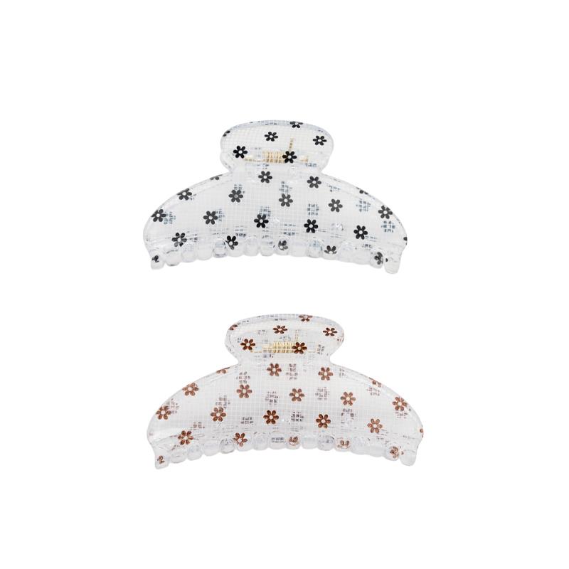 Pinza de pelo translucida grande con agarre fuerte.